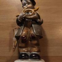 Scultura in ceramica bambino con corno