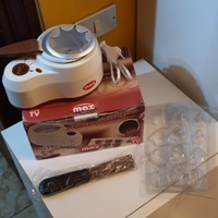 Cioccolatiera fonduta e cioccolatini. NUOVA