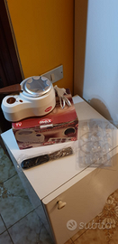 Cioccolatiera fonduta e cioccolatini. NUOVA