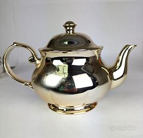 teiera in porcellana smaltata color oro