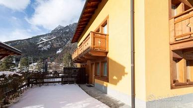 Appartamento con giardino e garage