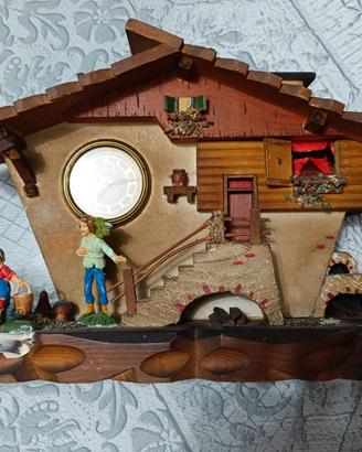 casetta con orologio meccanico anni 50