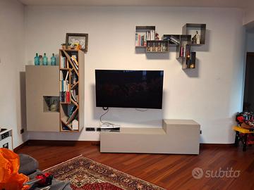 Parete attrezzata VOLTAN  spatolta cemento