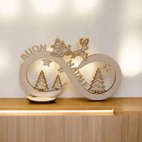 infinito con slitta di babbo natale su legno