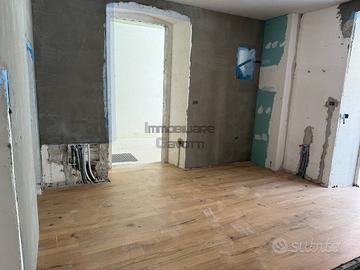 BILOCALE CON AREA ESTERNA