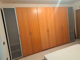 Armadio Pax Ikea a 8 ante con scomparti e cassetti