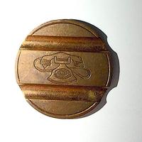 Gettone telefonico 7804