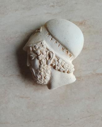calamita di testa di antico greco 