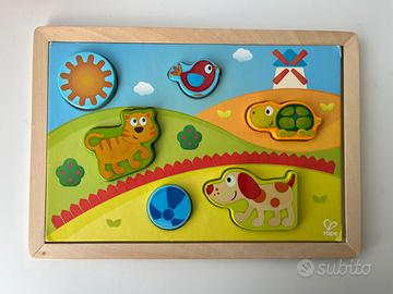 Hape - Puzzle legno intercambiabile (2 sfondi)