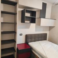 Camera con letto piazza e mezza e rete elettrica