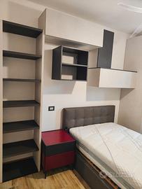 Camera con letto piazza e mezza e rete elettrica