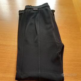 pantaloni e stivali da equitazione