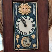 quadro con mattonella ed orologio 