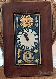 quadro con mattonella ed orologio 