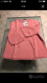 Maglione nuovo con etichetta