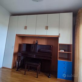 armadio a ponte con 2 letti. no materasso e piano 