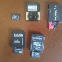 4 micro sd + 1 MultiMediaCard (MMC)