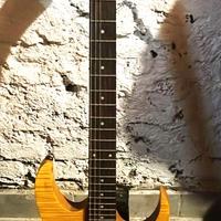 chitarra elettrica Ibanez RG320FM di colore ambra