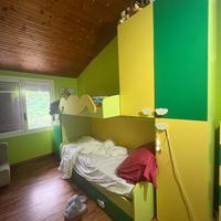 parete letto con tre letti