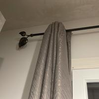 Tenda con bastone in ferro battuto