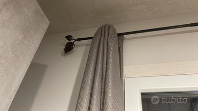 Tenda con bastone in ferro battuto