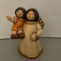 Thun angelo con bambino 2009