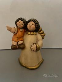 Thun angelo con bambino 2009