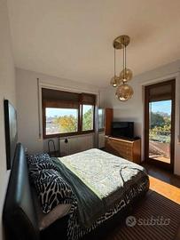 Montagnola attico arredato con posto auto