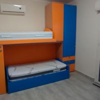 Camera da letto per bambini con materassi