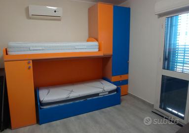 Camera da letto per bambini con materassi