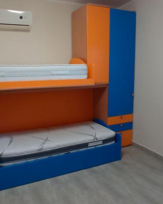 Camera da letto per bambini con materassi