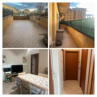 Appartamento con terrazzi, garage e cantina