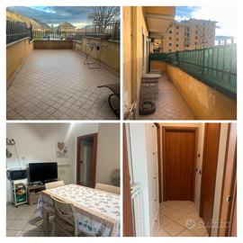 Appartamento con terrazzi, garage e cantina