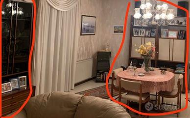 Soggiorno con tavolo rotondo allungabile e sedie