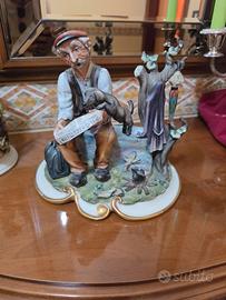 Statuetta Capodimonte Anziano con Cane e Giornale