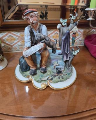 Statuetta Capodimonte Anziano con Cane e Giornale