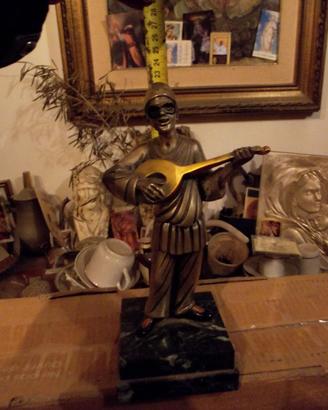 statua