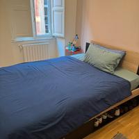 Letto matrimoniale con contenitore di legno