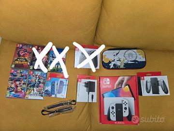 nintendo switch oled, più giochi e accessori