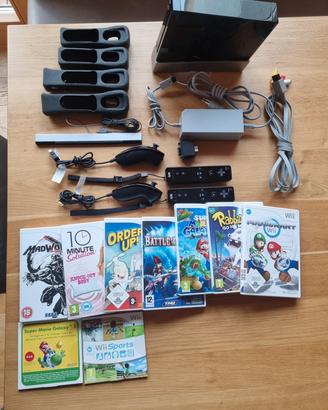 Nintendo wii nera con controller e set di giochi