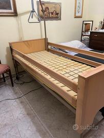 Letto elettrico da degenza con sponde regolabili
