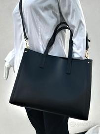 Borsa tracolla  in vera  pelle nera. Carpisa Nuova