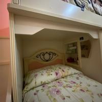 Letto a soppalco con armadio e secondo letto