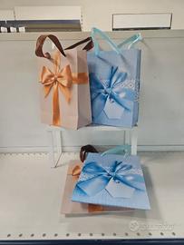 4 shopper di carta 18x23+10 cm fiocchi