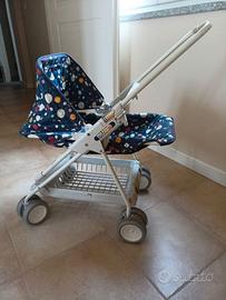 Passeggino giocattolo bambole Pliko