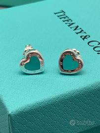 Orecchini Tiffany e anelli Bulgari