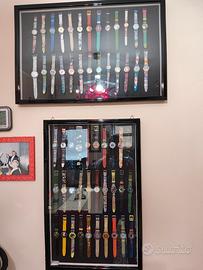 56 orologi SWATCH con 2 vetrine 