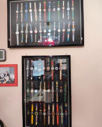 56 orologi SWATCH con 2 vetrine 