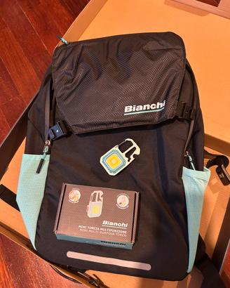 Zaino + luce multifunzione bici Bianchi