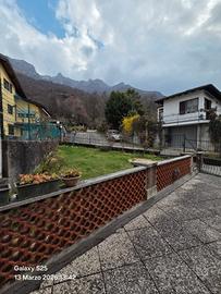 Ampio trilocale con giardino